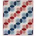 A red, white, and blue patriotic quilt featuring a geometric design isolated on a white background