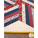 A close up on the patchwork, showing fabric colors and print details.