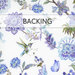 White swatch of fabric with a blue, purple, and green watercolor style pattern of hummingbirds and flowers. A banner at the top reads 