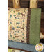 A shot of the right side of the Magic Pillowcase, showing details of the green and brown fabrics at the pillowcase opening.