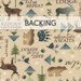 A swatch of light tan fabric with outdoorsy motifs like words, moose, deer, elk, bears, trees, and pinecones. A banner at the top reads 