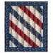 A patchwork quilt featuring red, white, and blue diagonal stripes, surrounded by a decorative patriotic border.