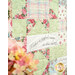 A super close up on the patchwork of the quilt, highlighting a panel piece that reads, 