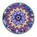 A top down shot of the completed Point of View Kaleidoscope Folded Star Table Topper colored in vibrant purple fabrics from the Pansy Perfection collection, isolated on a white background.