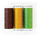 The 3 piece Point of View Folded Star Table Topper Sunflower Farm thread set, isolated on a white background.