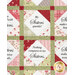 A head-on shot of the quilt, demonstrating fabric, panel, sashing, and border details.