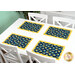 A wide shot of the four placemats on a white table.