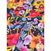 A super close up on the center patchwork of the topper, demonstrating color and print details on the fabric.