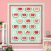 The completed Watermelon Patchwork quilt in colorful aqua, pink, red, and green fabrics featuring watermelon slices, displayed against a pink wall staged with coordinating decor and watermelon slices; this image shows the quilt without the optional laser cut watermelon seeds.