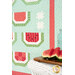 A closer look at the quilt, with a tray of real watermelon slices peeking into frame from the right side.