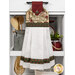 The completed Hanging Towel colored in green, cream, and red fabrics from the A Vintage Christmas collection, staged on a kitchen drawer with coordinating decor.
