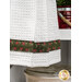 A close up on the fabric stripe through the bottom of the towel.