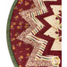 A top-down shot of the outer edge of the table topper, demonstrating fabric, binding, and prairie point details.