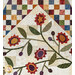 A closer look at the appliqué flowers below the bottom points of the star, showcasing collection colors and prints.