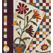 A closer look at the appliqué flowers between the left side points of the star, showcasing collection colors and prints.