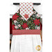 A head-on shot of the top of the towel, demonstrating fabric color and print details on the main fabrics.