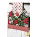 A super close up on the top of the towel, demonstrating fabric color and print details on the main fabrics.