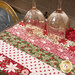 A close up on the completed mat, demonstrating fabric strips' prints and colors.