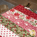 A close up on the completed mat, demonstrating fabric strip print and color details.