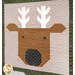 A quilted panel featuring a stylized brown reindeer head with antlers against a patterned background.