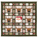 Colorful quilt featuring reindeer faces and a Santa block, surrounded by decorative holiday elements isolated on a white background.