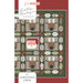 A quilt pattern featuring reindeer and a Santa design on a festive background, labeled Christmas Crew.