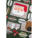Quilt featuring a pixelated Santa face surrounded by festive geometric patterns and leaves.