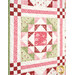 A super close up on one of the blocks, demonstrating details on the patchwork, fabric, and top quilting details.