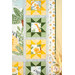 A shot of the right side of the quilt, demonstrating the yellow and green quilting stars and border and binding details.