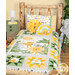 A shot of the quilt staged on a cabin bed with coordinating minky pillows and a Sunny Safari pillowcase.