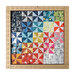 The completed Ruler Frame with a mini quilt of pinwheel blocks on display.
