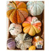 The back of the pattern with the finished fabric pumpkins displayed in a small wooden box.