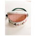 A shot of the Belt Bag with the zipper open to show the space inside.