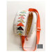 The back of the pattern with the finished fanny pack displayed on a white table.