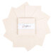 A top-down shot of fanned out ivory Confetti Cottons 5