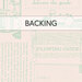 A swatch of cream fabric with mint green blocks of text, plowing guides, and farm motifs like barns and cows. A banner at the top reads 