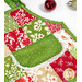 A closer look at one of the apron themed hot pads, demonstrating print colors and details as well as details on the white lace trim of the pocket.