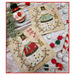 The completed project, two snowmen in red and light blue, staged with coordinating winter and holiday decor.