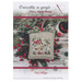 Front of pattern showing a picture of the completed project staged with holiday decor.