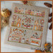 The completed project staged with coordinating autumn decor.