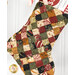 A close up on the stocking patchwork, showing the A Vintage Christmas fabric details.