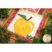 A close up on the yellow apple block, framed by a decorative leafy garland.