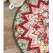A top down view of the outer edge of the topper, demonstrating fabric, prairie point, and binding details.