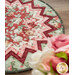 A shot of the table topper with out-of-focus roses peeking into frame.