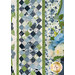 A close up of the bottom right corner of the quilt, staged with coordinating blue and white florals.