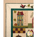 A closer look at the top left corner of the quilt, showing details on the binding and inner and outer borders with appliqué details.