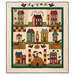 The completed Autumn House BOM Quilt, featuring whimsical houses and pumpkins in saturated earth tones, isolated on a white background.