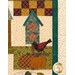 A close up on a block of the quilt with an appliqué blue bird house, two orange pumpkins, and a bird in front of patchwork.