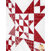 A super close up shot of one of the quilting star blocks, showcasing fabric and piecing details.