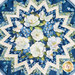 A close up on the center of the Point of View Folded Star Table Topper, demonstrating detail on the focal fabric, a blue fabric with white and blue flowers with spring green leaves.